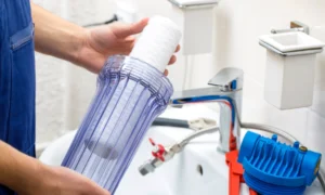 plumber installing water filtration system plumber installing water filtration system